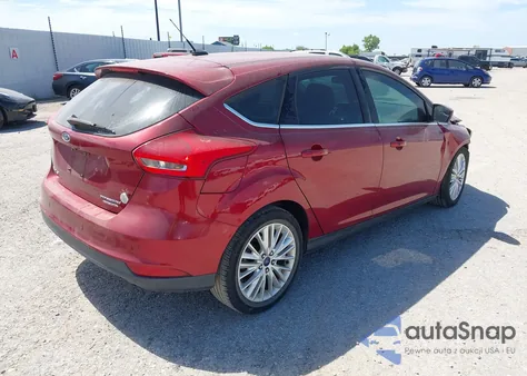 2016 Ford Focus Titanium z USA, uszkodzony, nr VIN 1FADP3N27GL256143